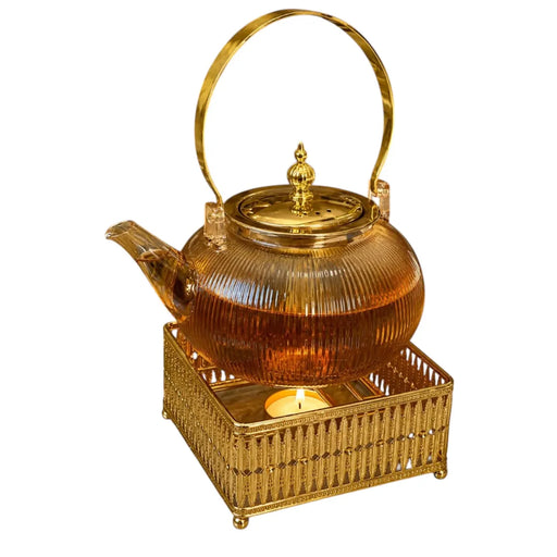 Elegant 1000ml amber tinted clear borosilicate glass teapot with a modern ribbed body pattern, gold-colored lid, and matching gold handle on Spotngrab Lebanon.