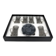 A complete a box of 12-piece smoky grey glass tea service set showing six vertical ribbed glasses with handles sitting on their matching fluted saucers on Spotngrab Lebanon.