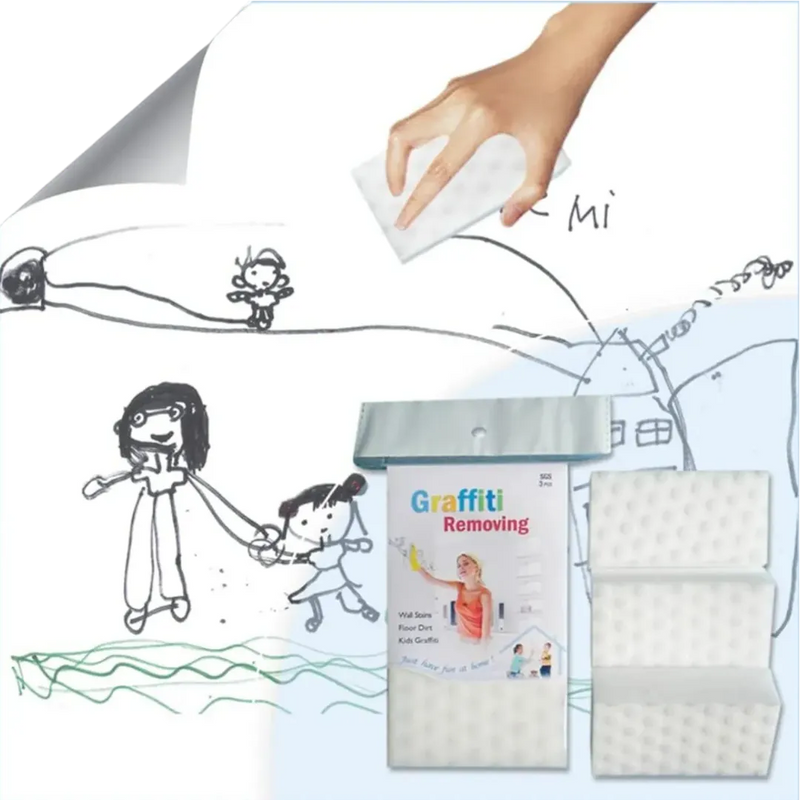Magic sponge removing kids drawings and graffiti from wall