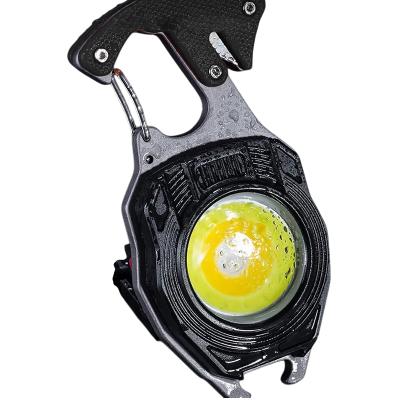 Multi-purpose rechargeable LED emergency keychain light displaying the bright flood beam and integrated tool attachments on Spotngrab Lebanon