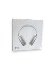 White over-ear headphones shown on a white square product card with the text 'pg' near the bottom left, photographed against a white background.