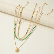 Layered gold-tone bohemian necklace set with turquoise pendants – 4 pieces available at spotngrab lebanon