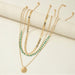 Layered gold-tone bohemian necklace set with turquoise pendants – 4 pieces available at spotngrab lebanon