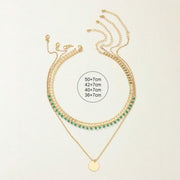 Layered gold-tone bohemian necklace set with turquoise pendants – 4 pieces available at spotngrab lebanon