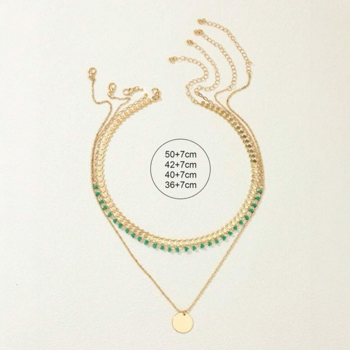Layered gold-tone bohemian necklace set with turquoise pendants – 4 pieces available at spotngrab lebanon