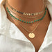 Layered gold-tone bohemian necklace set with turquoise pendants – 4 pieces available at spotngrab lebanon
