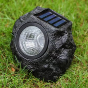 Natural stone-shaped solar garden light for outdoor landscaping - Spotngrab Lebanon garden decor.